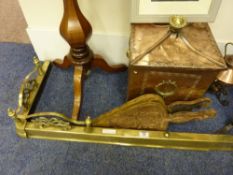 Adjustable brass fender, an Edwardian beaten copper coal scuttle and a pair of bellows