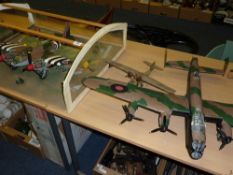 Two models of WWII bombers and a tin plate plane