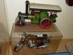 Model Honda 750 motorbike and a traction engine