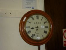 Oak cased single fusee LNER painted over the maker's name 'John Smith & Sons, Midland Clock Works,