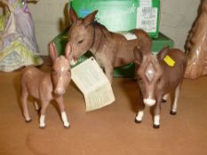 Three Beswick donkeys