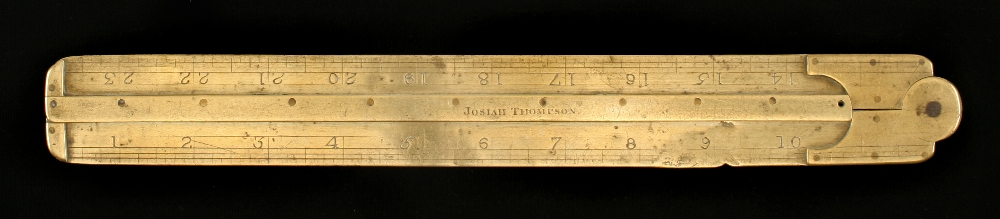 A 24" two fold brass rule by JOSIAH THOMPSON with supporting cover when closed (illustrated
