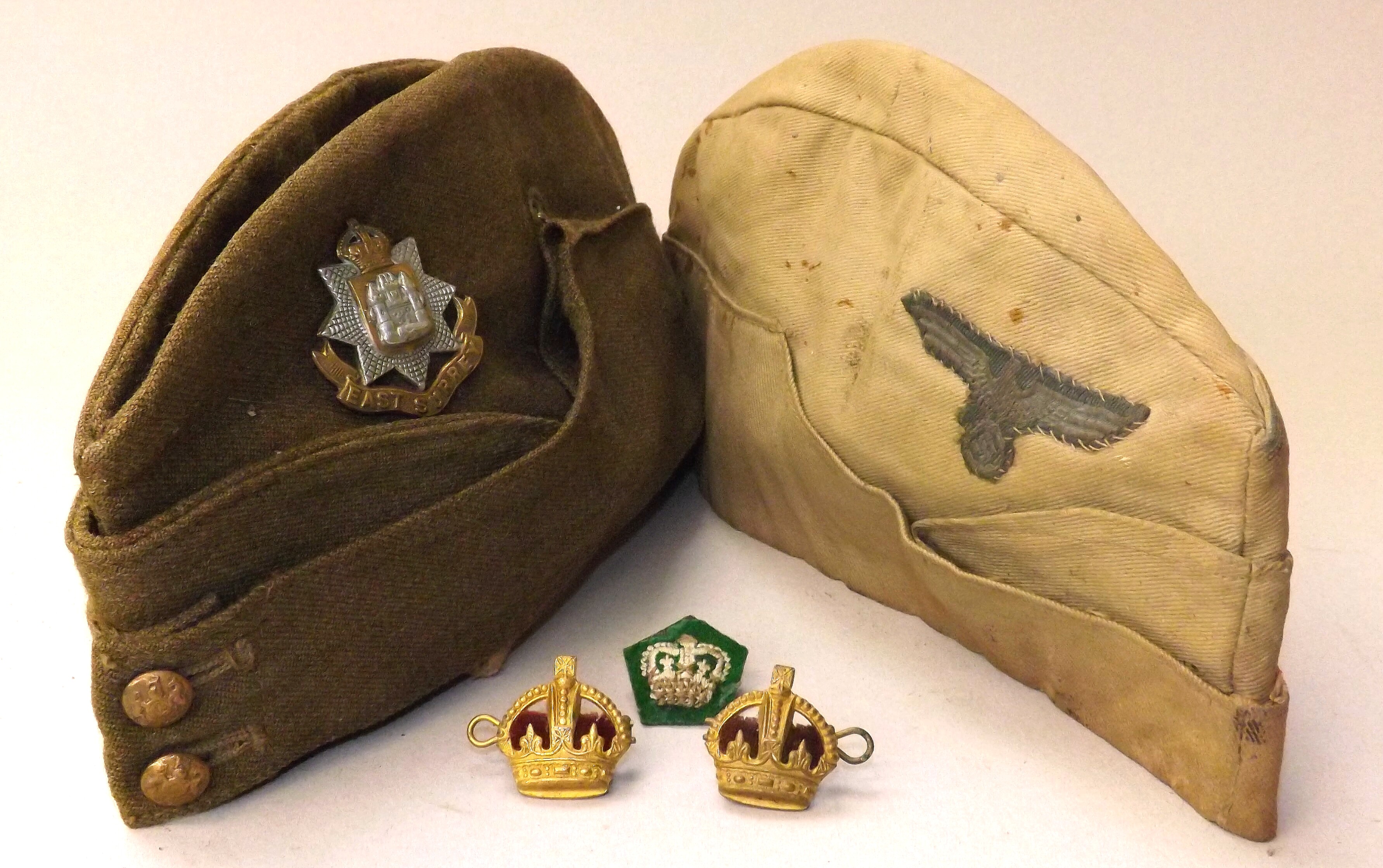 WWII uniform items to include a Third Reich khaki cloth cap with eagle stitched badge, an English