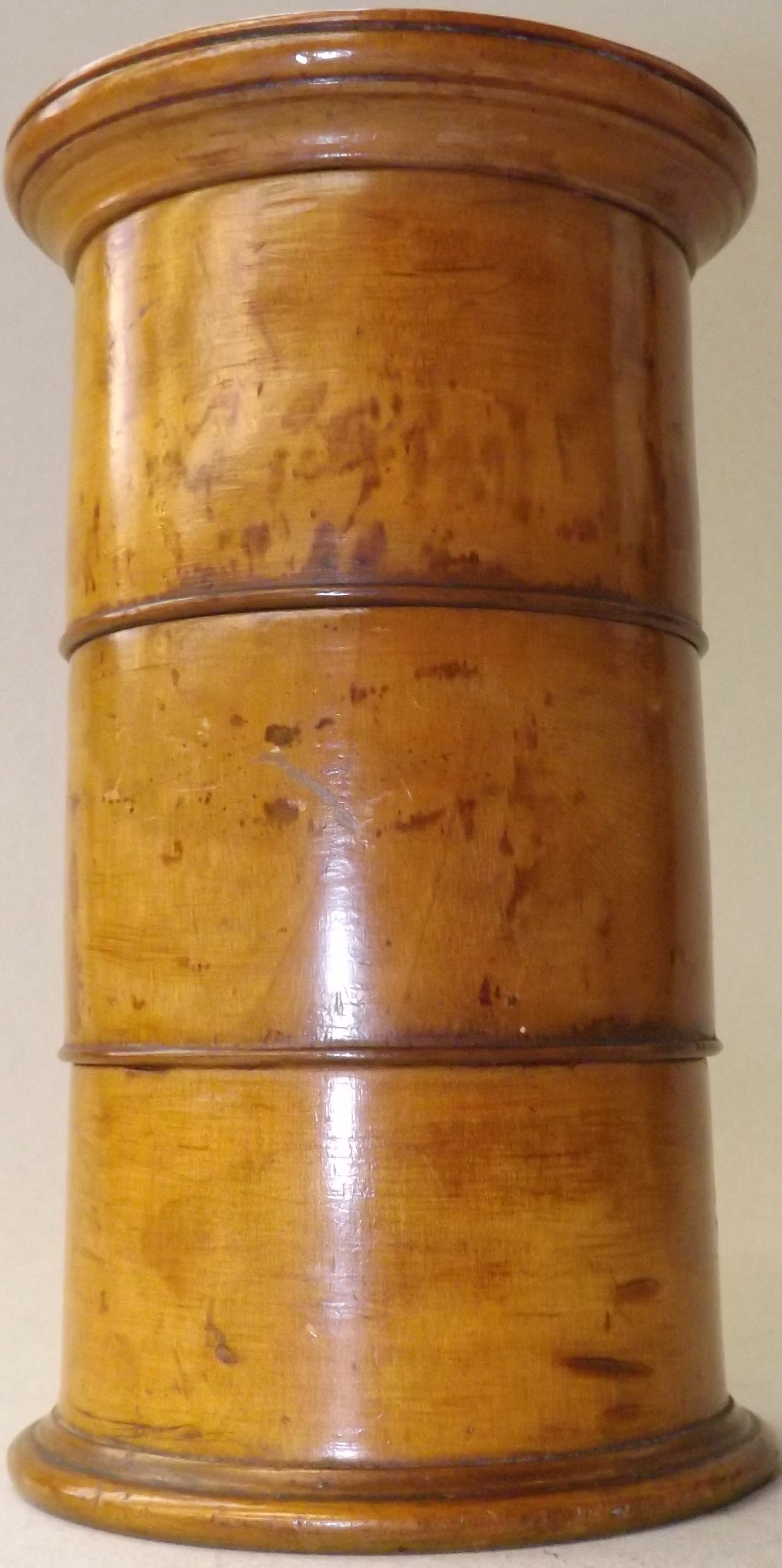 A 19th century turned wood spice tower in three sections, height 15cm.