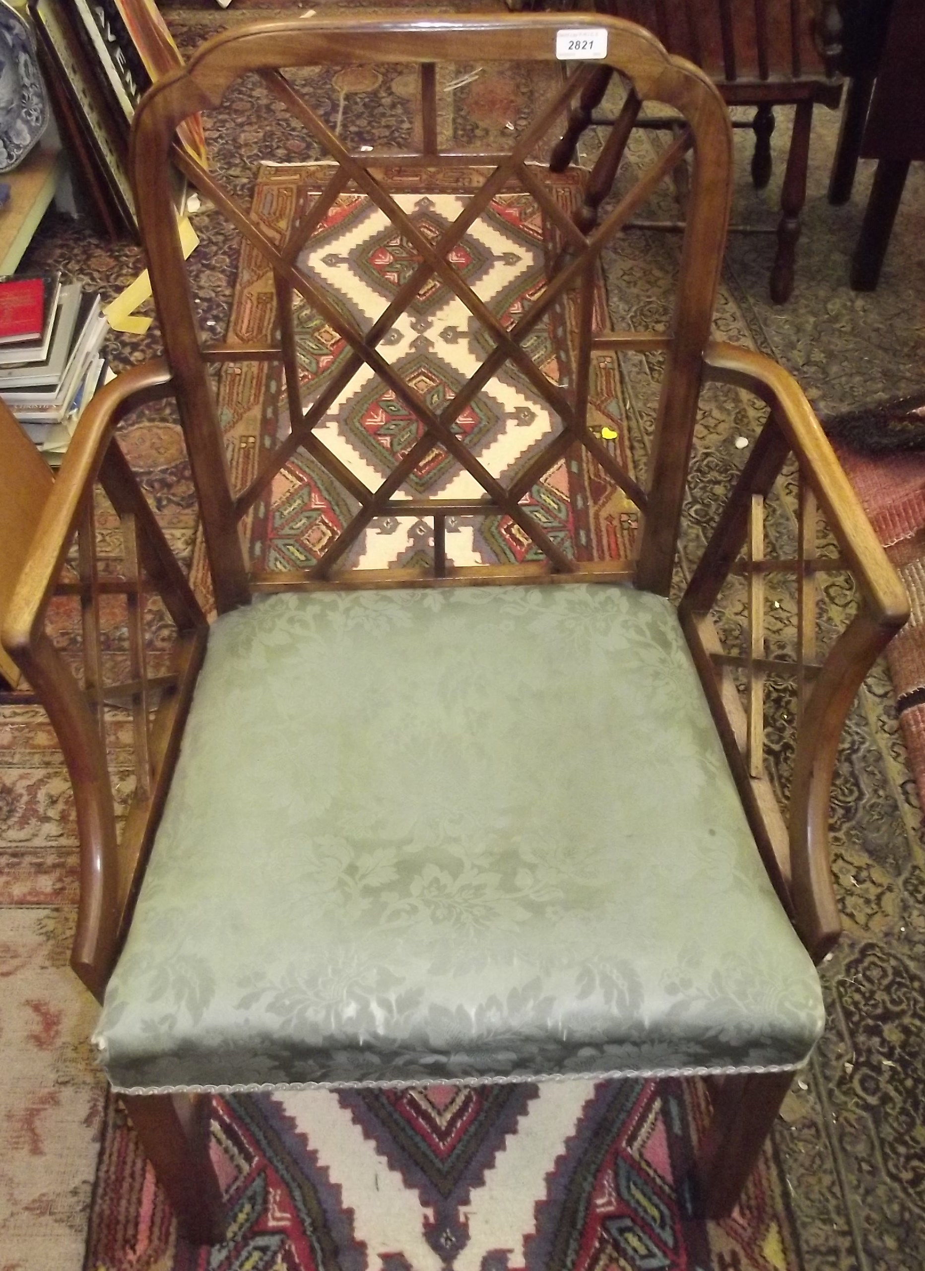 An 18th century, mahogany, Cockpen carving chair with re-entrant upper corners to the square back