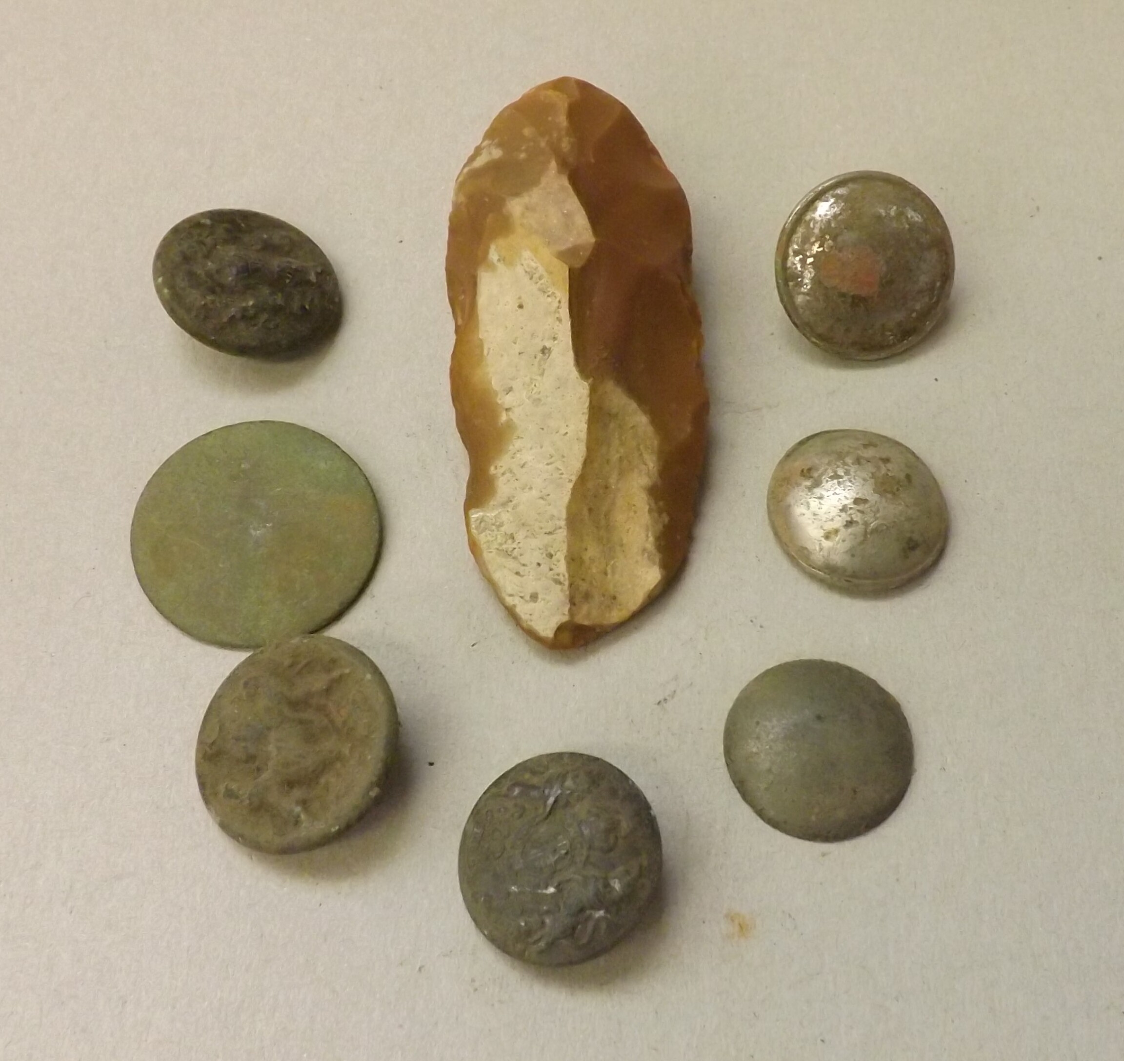 Neolithic stone tools, to include a scraper, three arrow heads etc.