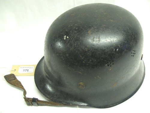 A post war German DIN 14940 marked Fire or Emergency Services helmet, maker unknown, painted