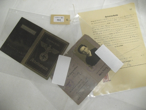 Three German Third Reich official documents, comprising a Kennkarte (ID card) issued in Essen 15