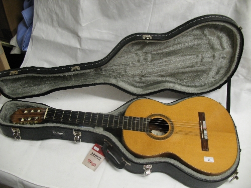 A Spanish guitar, labelled Glanvill Guitars by Laurence Bates Cottingham with screw fitted