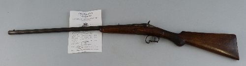 A deactivated Belgian .410 (9mm) single barrel shotgun, with walnut stock, chequered grip, scrolling