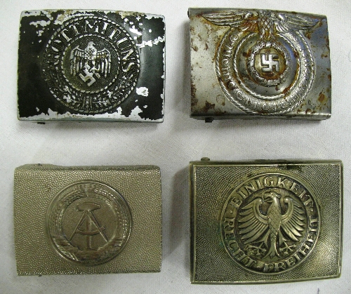 Four German army belt buckles, two Third Reich, one Bundeswehr (West Germany) and one DDR (East