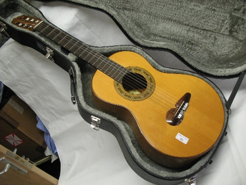 A parlour guitar, labelled Glanvill Guitars no 5 1984 Laurence G Bates with mahogany two piece back,