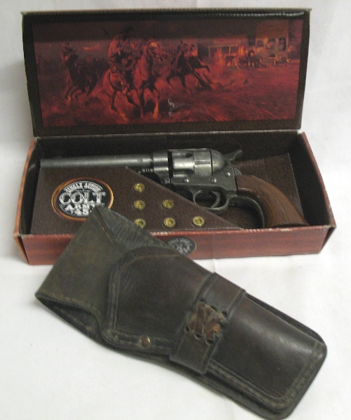 A replica single action colt army .45 revolver, boxed, with dummy cartridges, together with a