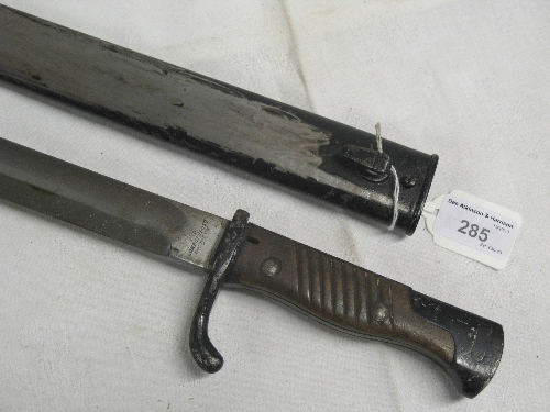 A World War I German Mauser bayonet, the 37cm steel blade marked Luneschloss Solingen and dated