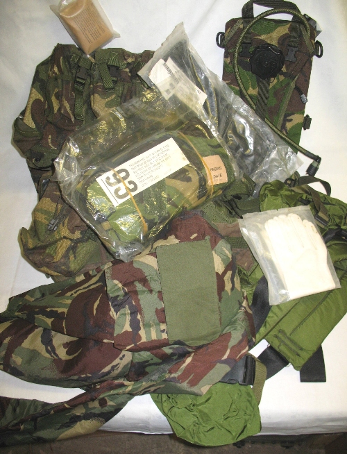 A quantity of military clothing and equipment, including a set of ninety five webbing, British and