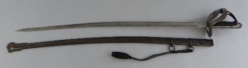 A cavalry style sword, the modified 85cm steel slightly curving blade with traces of chasing,