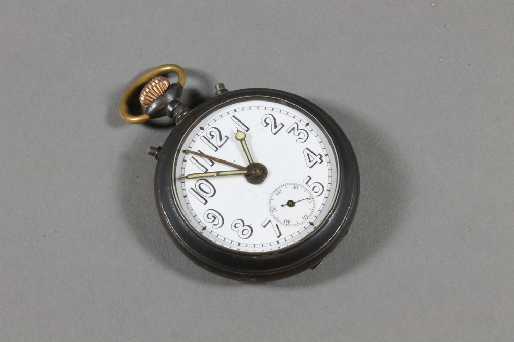 A German open faced alarm pocket watch with enamelled dial  and Arabic numerals contained in a gun