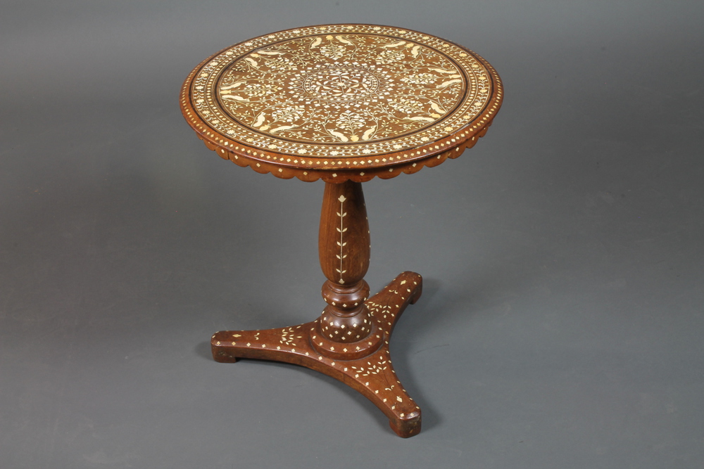 An Anglo Indian hardwood circular occasional table, the top profusely inlaid with ivory and bone