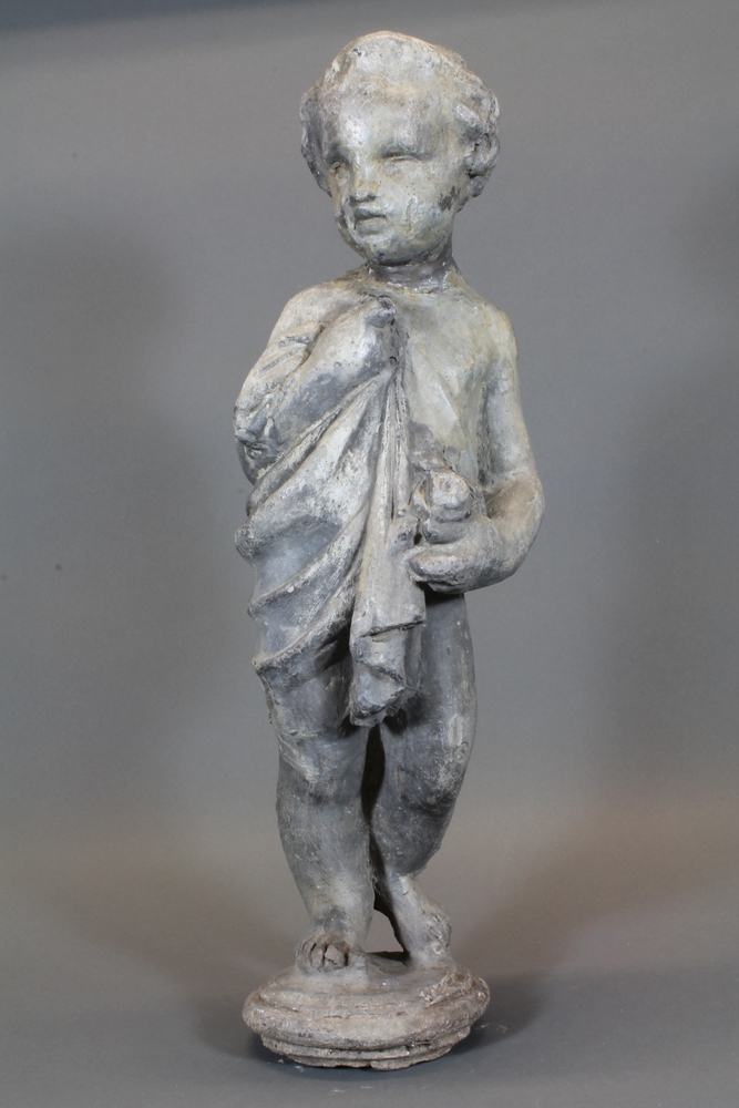 A lead figure of a standing cherub 21"  ILLUSTRATED