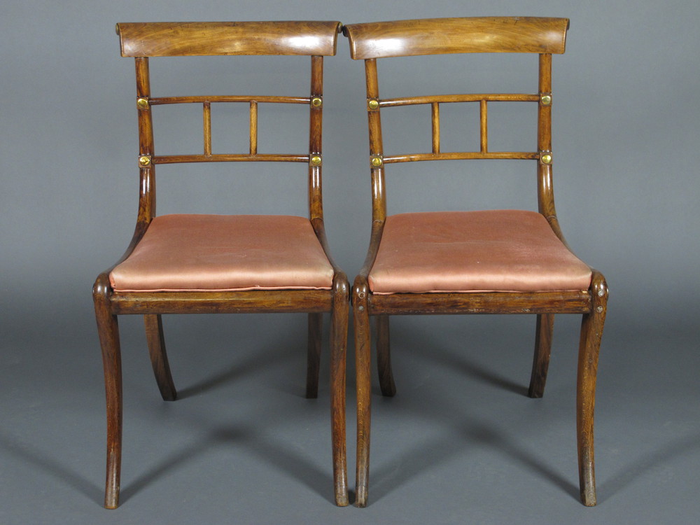 A set of 6 19th Century mahogany bar back dining chairs with  shaped mid rails and woven cane seats,