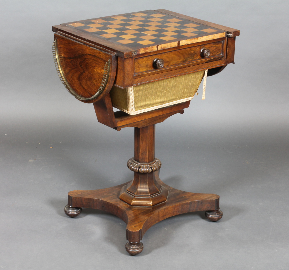 A Regency rosewood drop flap games/work table, the lid inlaid  a chessboard, the interior inlaid a