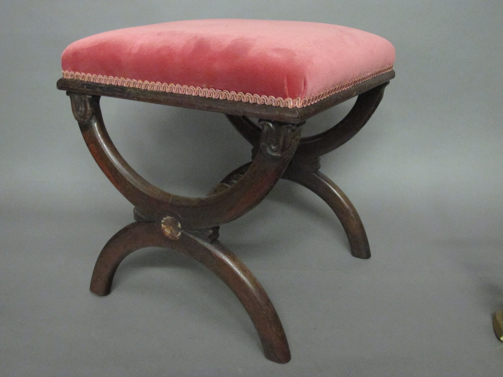 A Victorian Pugin style rectangular rosewood stool with  upholstered pink seat, raised on X framed