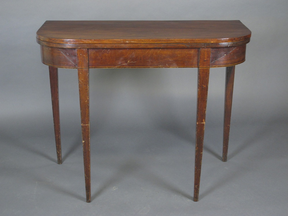 A Georgian mahogany D shaped tea table, raised on square  tapering supports 38" wide x 30" high x 18