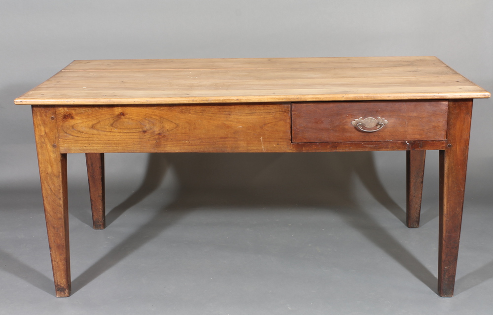 A 19th Century French cherry farm house table, fitted a frieze  drawer and pastry slide, raised on