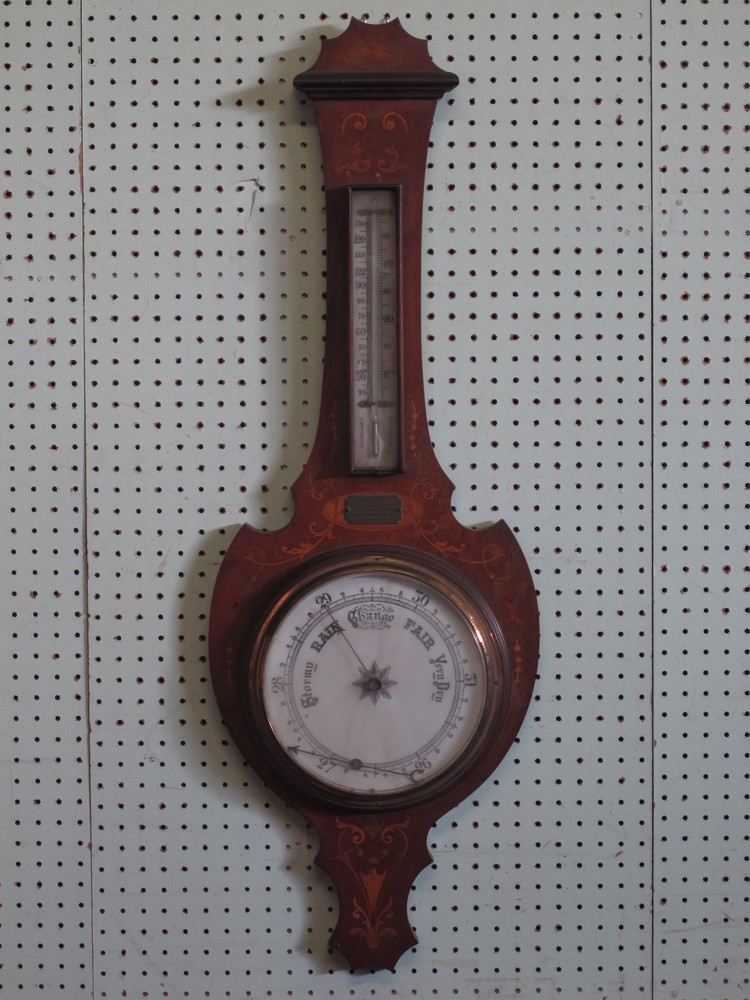 An Edwardian aneroid barometer and thermometer with porcelain  dial contained in an inlaid