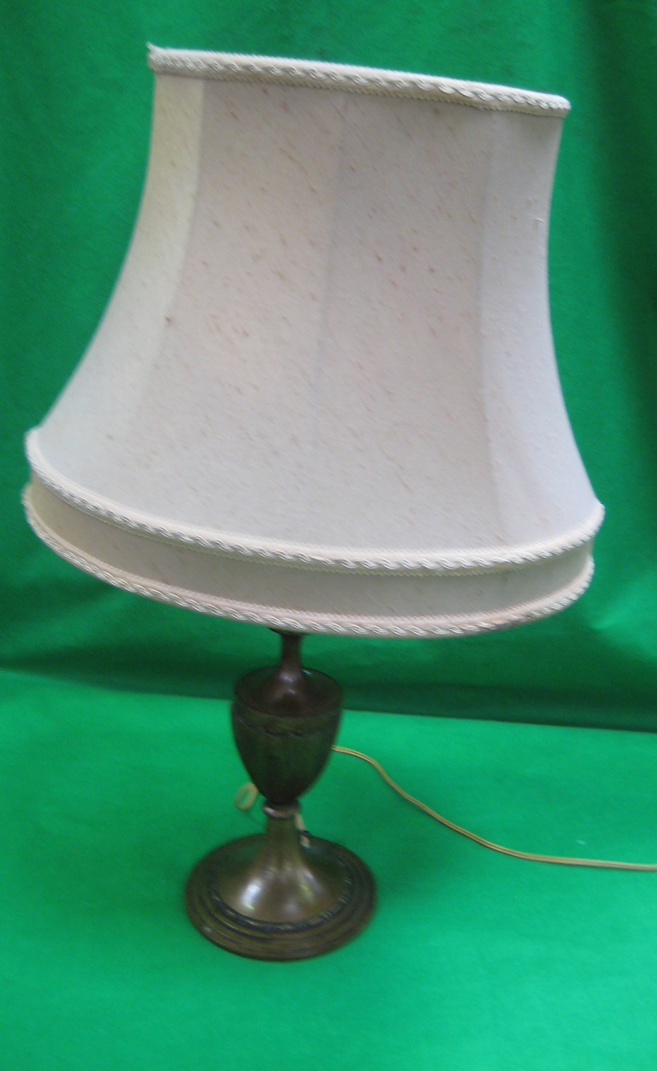 A gilt brass table lamp and shade