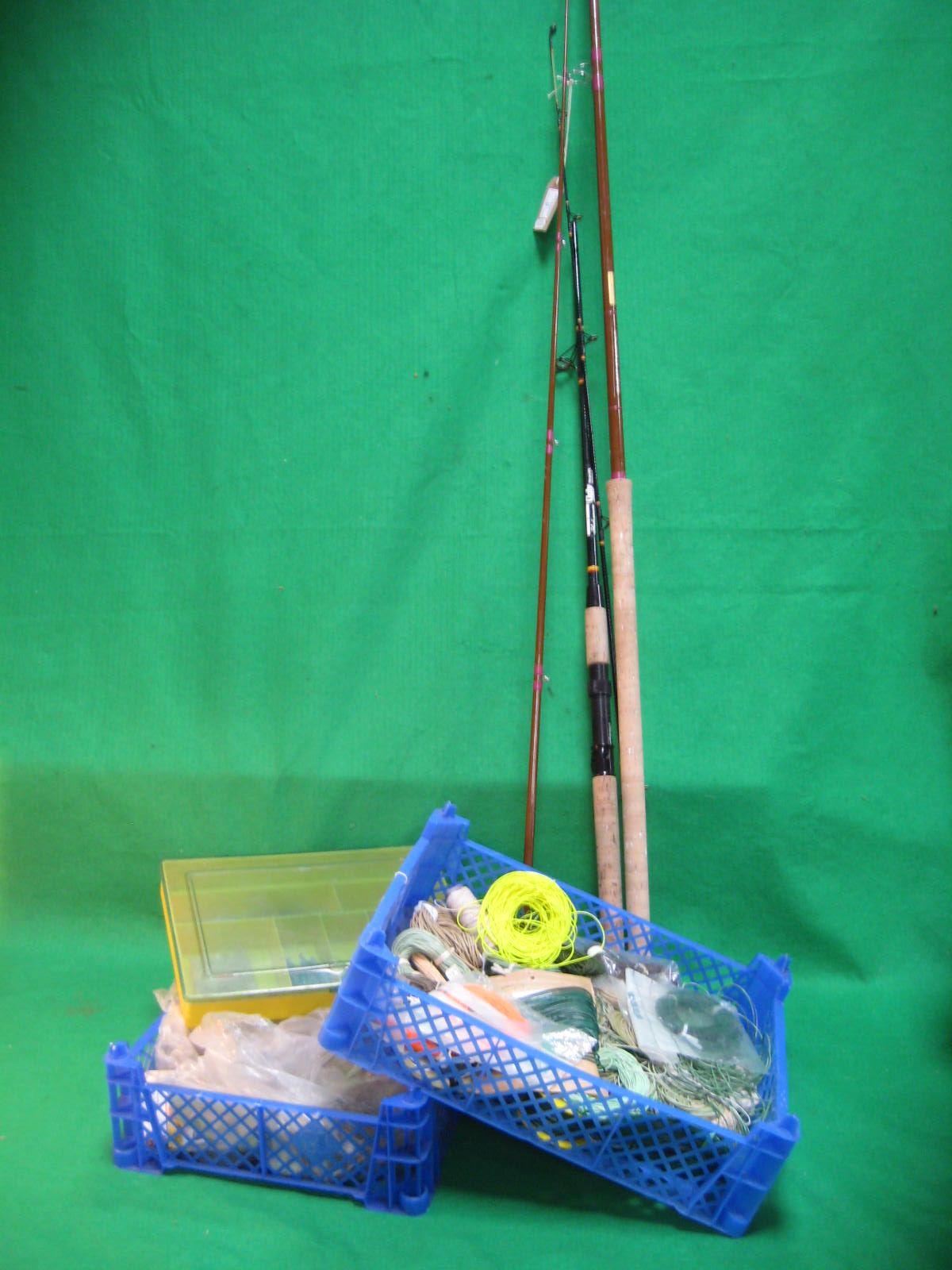 A collection of fishing tackle, rods, lines and accessories