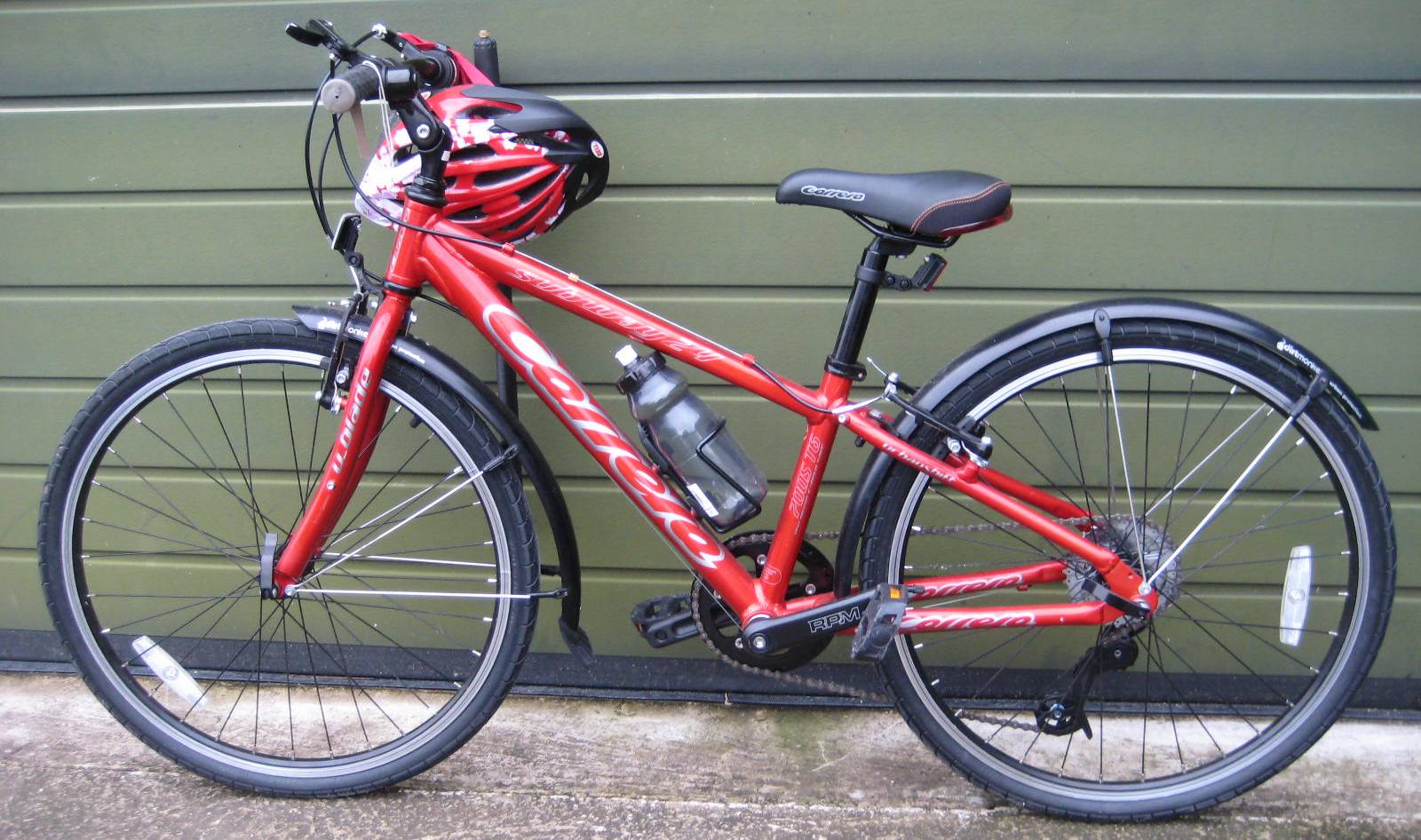 A Subway 24 bicycle, with pump and helmet