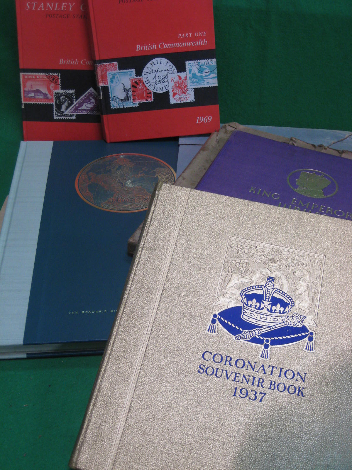Two Royal commemorative books, stamp catalogues etc