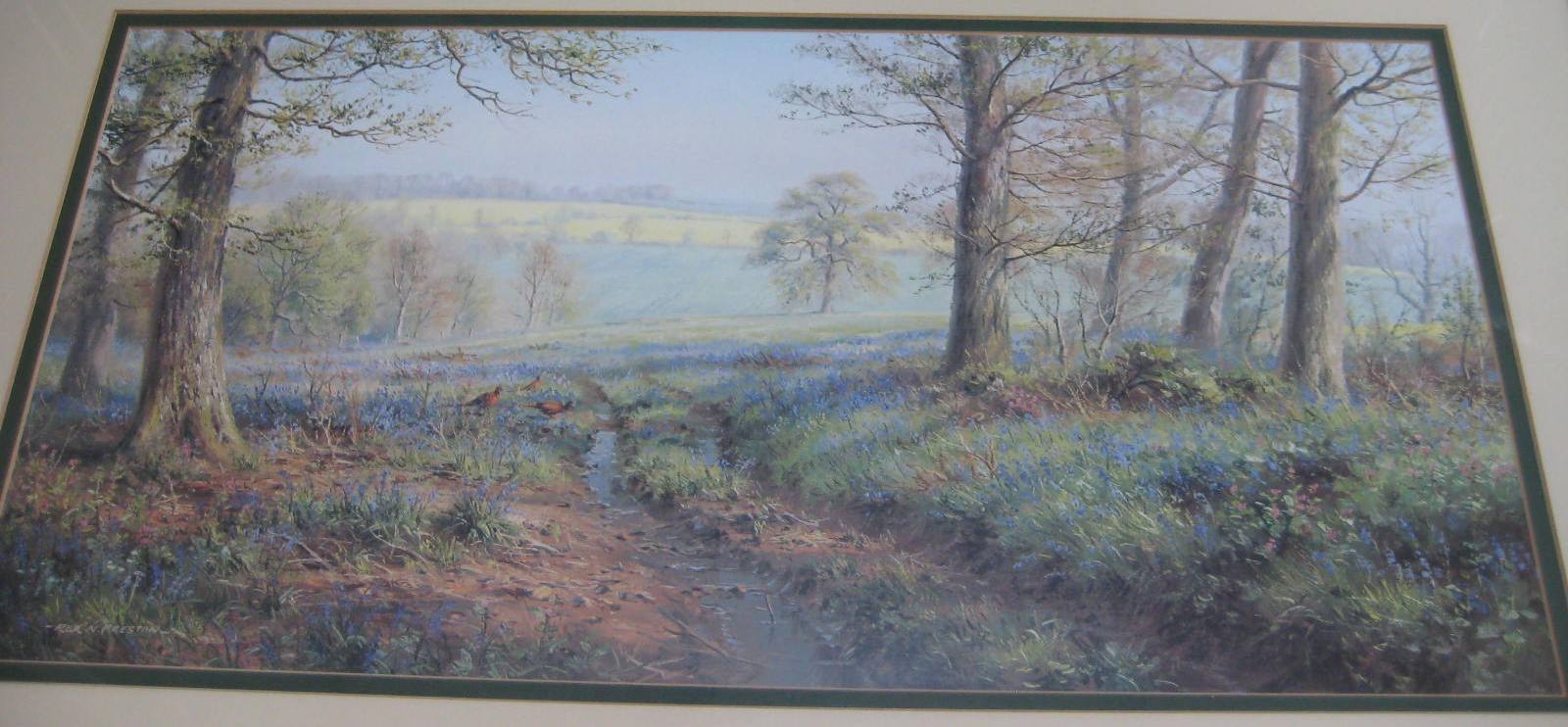 A large framed landscape print