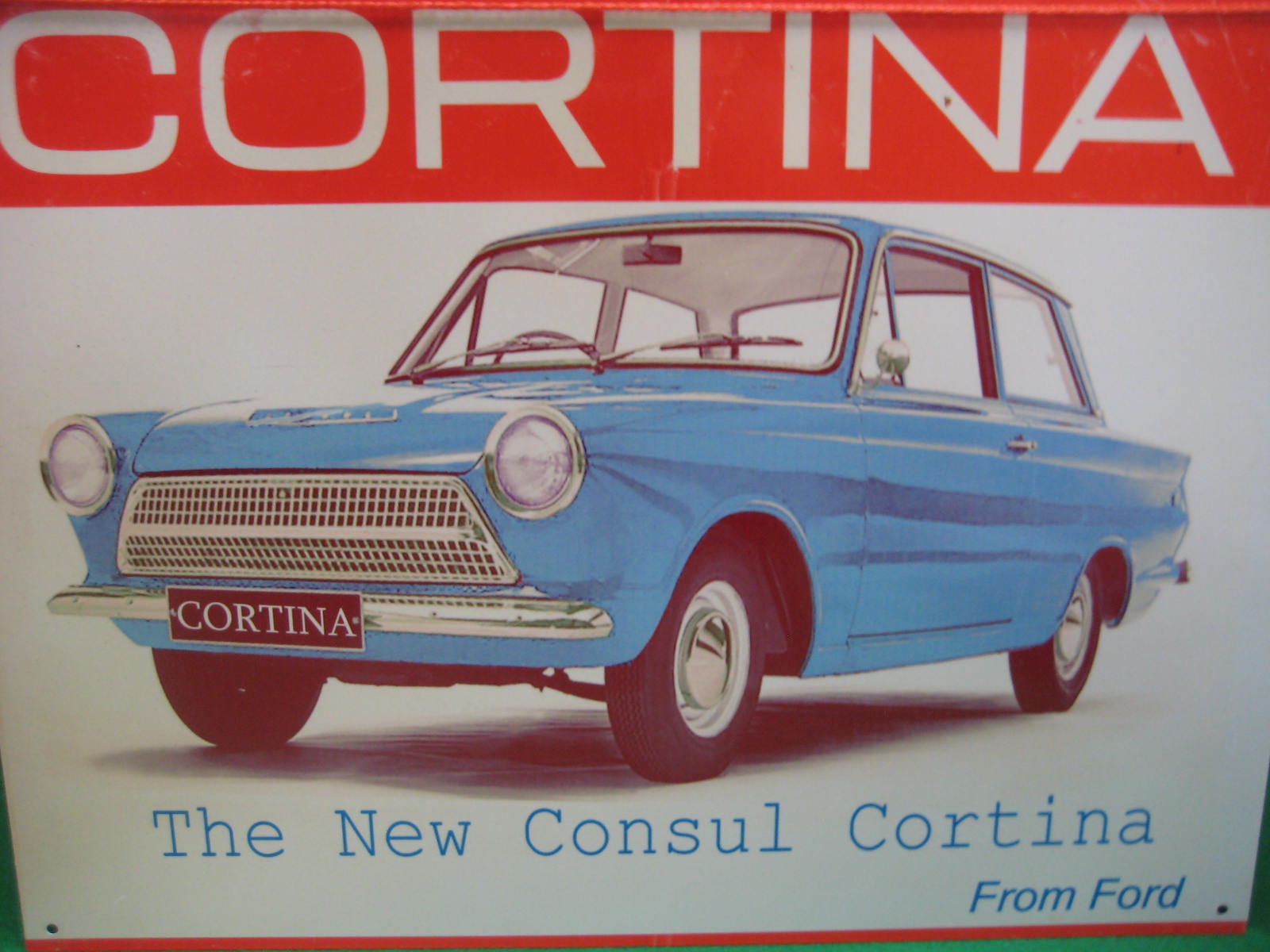 A tin advertising sign Cortina