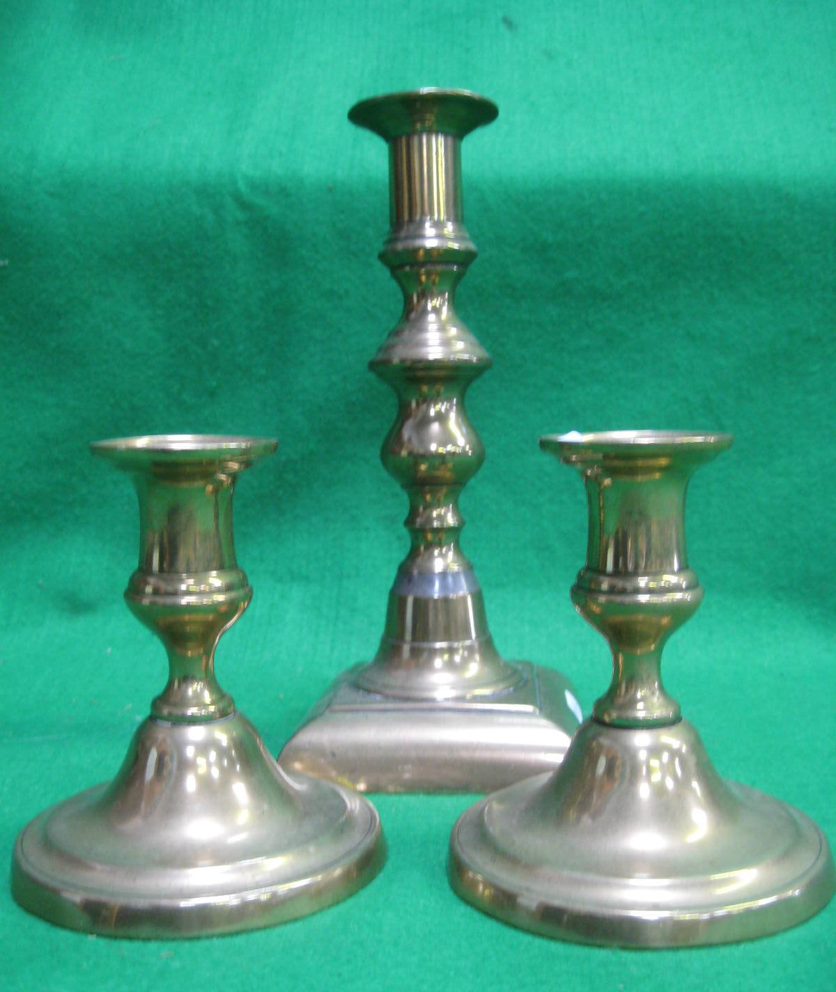 Three brass candlesticks