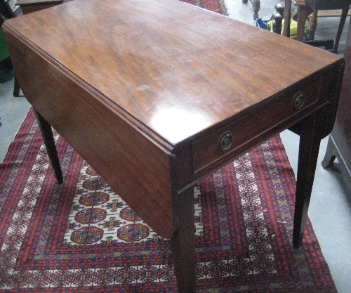 A 19th Century mahogany single drawer pembroke table on square tapering legs