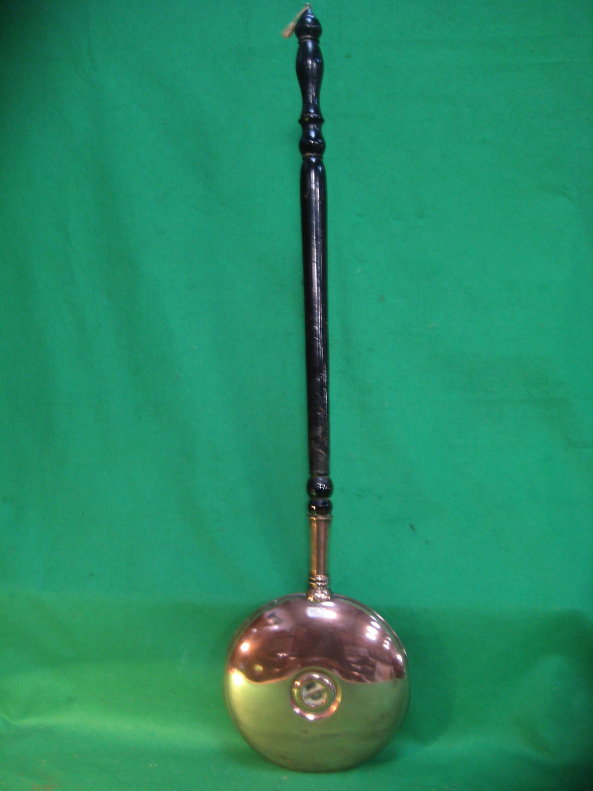 A Victorian copper `hot water` warming pan with turned wood handle