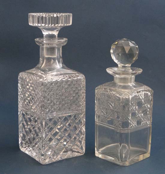 2 early-mid 20thC squared form lead crystal and glass decanters, the former with hobnail cut