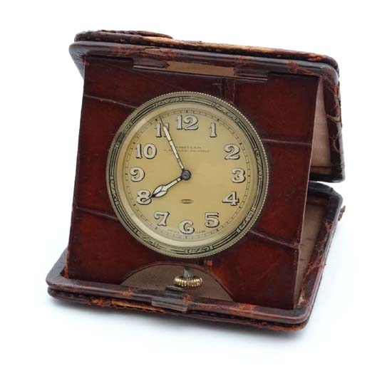 Whistler 11 Strand London : An Art Deco crocodile skin cased folding travel clock with an 8-day