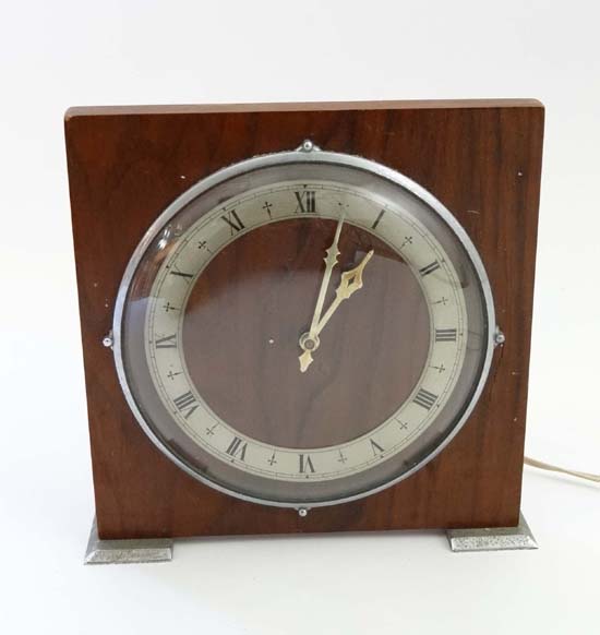 Art Deco Clock : Ferranti-An electric mantle clock with walnut surround and chromium mounts 7 1/2"