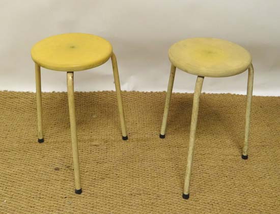Vintage Industrial : a pair of circular seated three legged stools , 11" dia and 18 3/4" high.