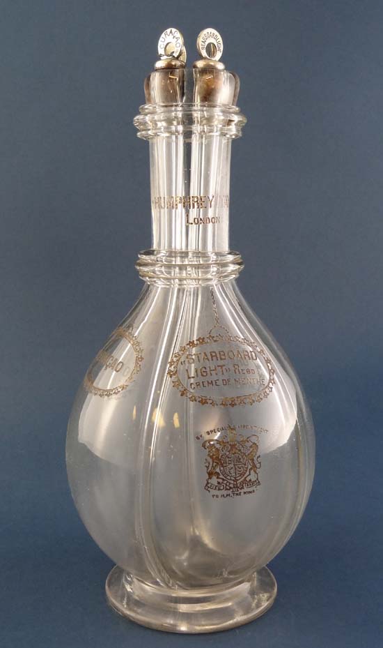 Glass : An unusual Edwardian gilt decorated Humphrey Taylor of London, quartered decanter marked
