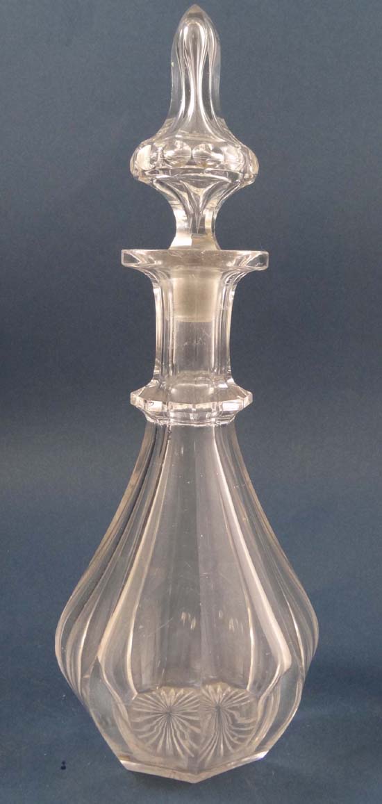 A 19thC cut glass decanter and stopper of octagonal bottle shape 11 3/4" high