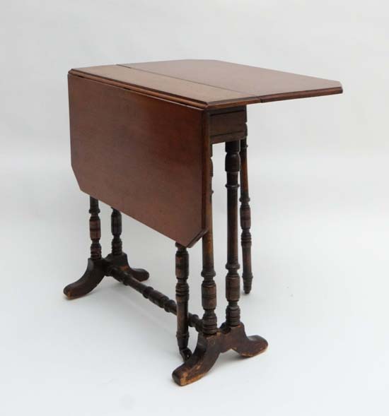 A small late Victorian mahogany Sutherland table with 6 legs and canted corners 21 1/4" wide
