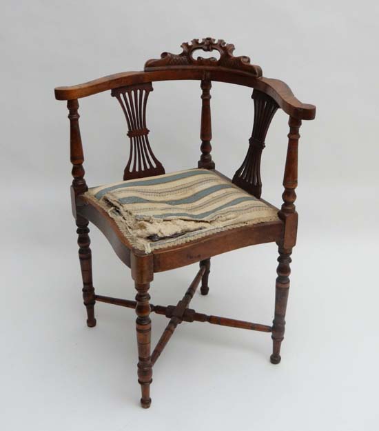A late Victorian stained beech corner chair with turned legs 30" high