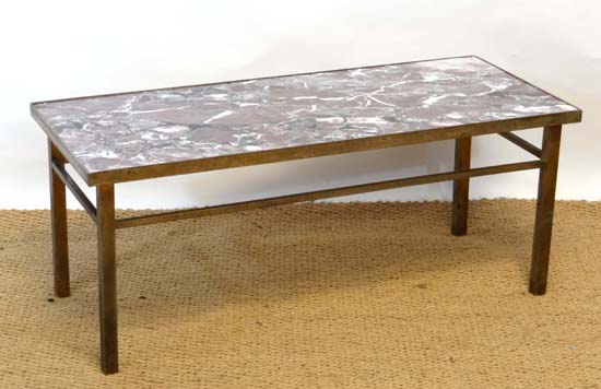 A marble topped brass four legged coffee table 16 1/3" x 38 1/4"