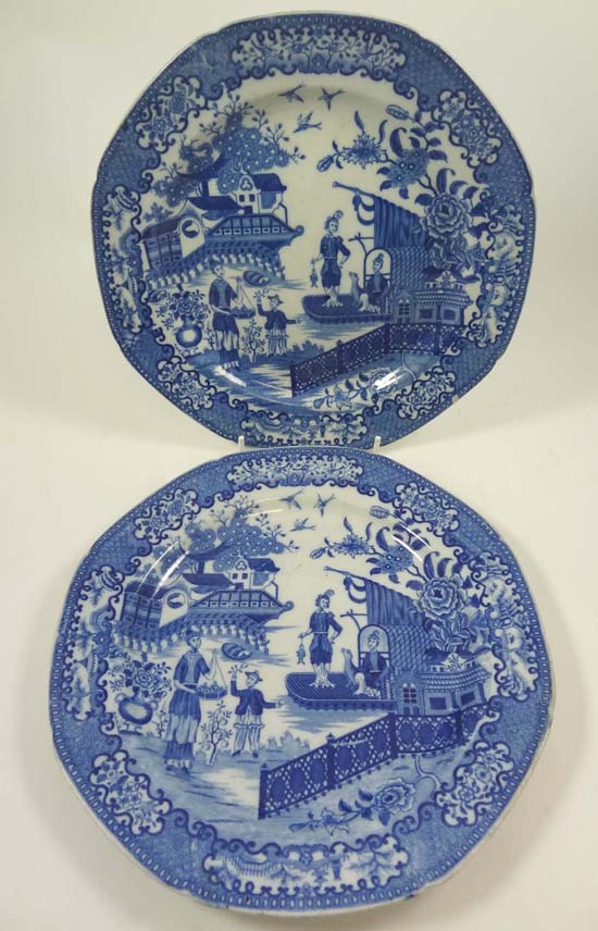 A pair of early 19thC octagonal shaped blue and white plates decorated in Chinoiserie pattern of a
