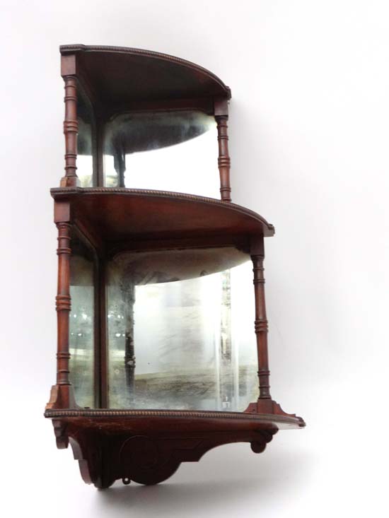 A late 19thC walnut mirror veneered and mirrored back corner set 3 tier waterfall shelves 24" high