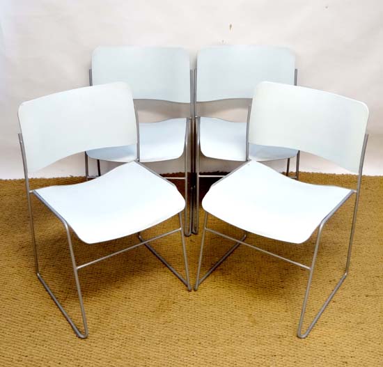 Vintage Retro : a set of four Danish Howe 40/4 Stackable Chairs with open arms, silver coloured